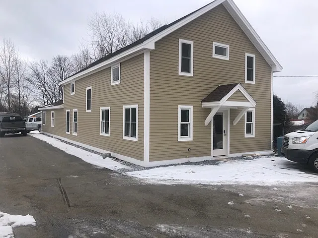 Exterior Of 2 Unit Duplex. This Unit is Located On Rear Of Building, Offering A Private Entrance, And Private Parking For 2 Vehicles.
