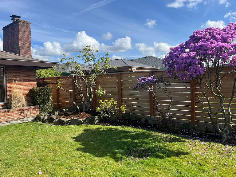 Great front yard on a quiet residential street. The lot is 6,000 square feet.