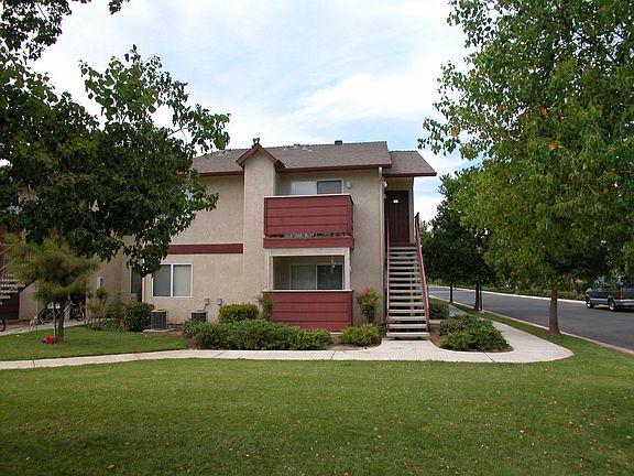 Building Exterior View From Grass Area