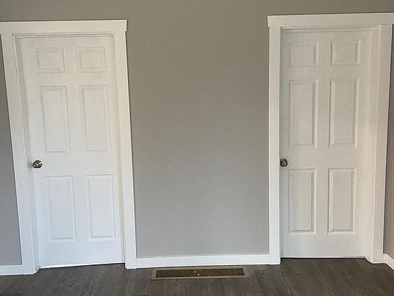 bedrooms off of the dining room