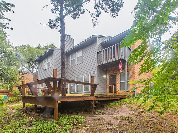 Backyard deck. Yard now has private fence.
