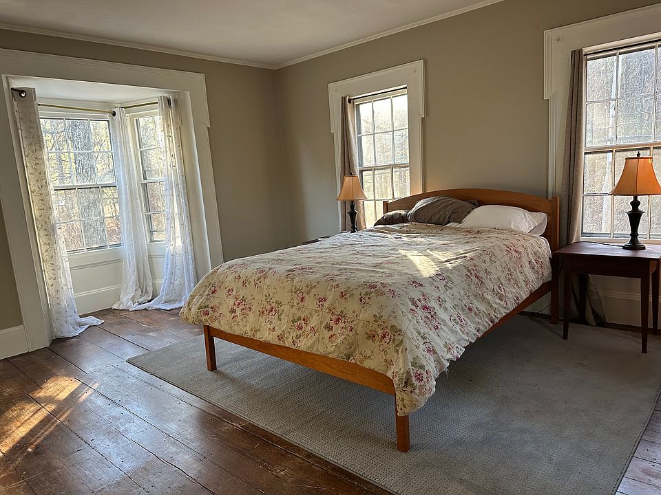 Big, bright main bedroom has also been used as a studio or upstairs living room.