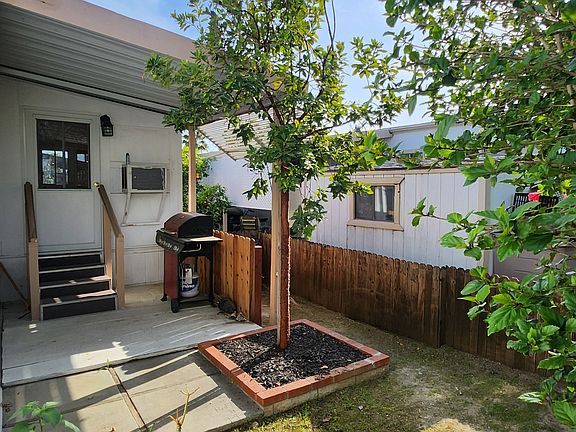 Fenced yard with deck