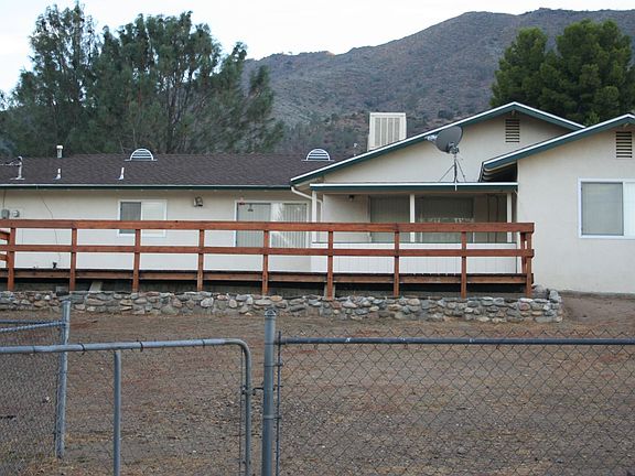 Big back yard with redwood deck, views of the mountains from