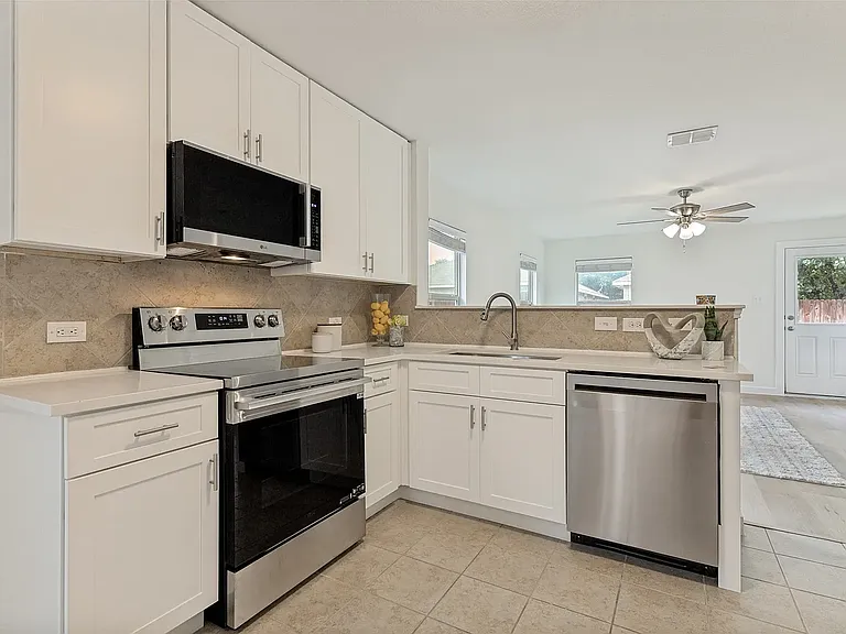 8828 Valley River Dr — Photo 3