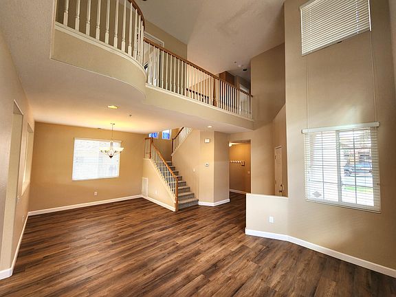 Looking back at the formal dining room from corner of the living room. Nice vaulted ceilings.