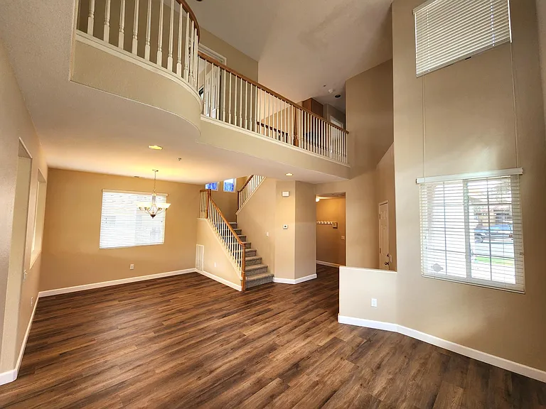 Looking back at the formal dining room from corner of the living room. Nice vaulted ceilings.