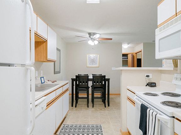 Our bright and functional kitchens offer easy access to the dining area.