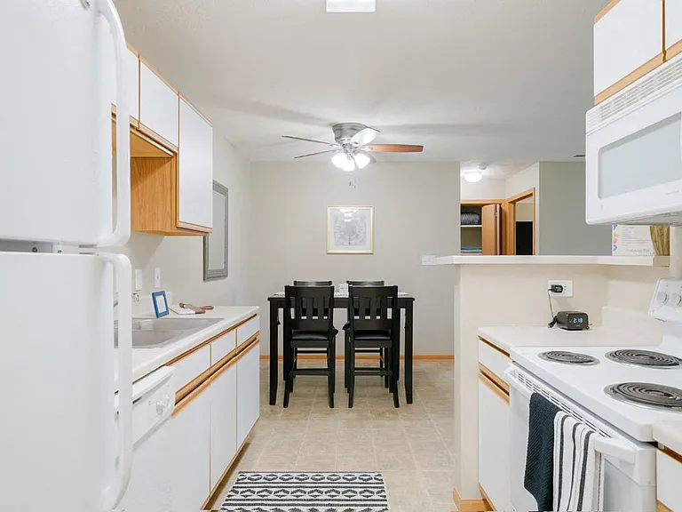 Our bright and functional kitchens offer easy access to the dining area.