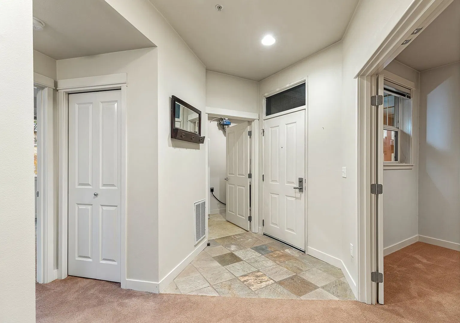2 bed 2 bath + den, rent includes water, sewer, garbage, and two parking spaces. — Photo 3