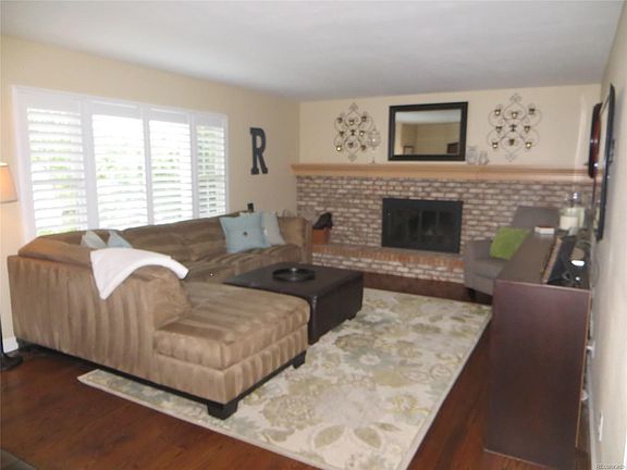 Family Room with wood burning fireplace.