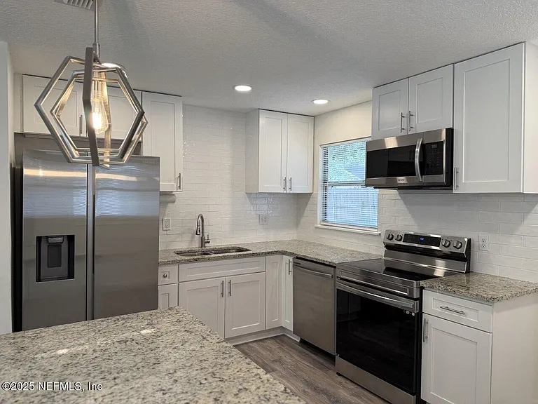 7262 Kivler Dr — Photo 5