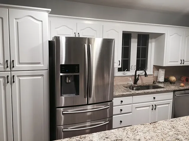 Spacious kitchen with big island. Stainless steel appliances throughout.