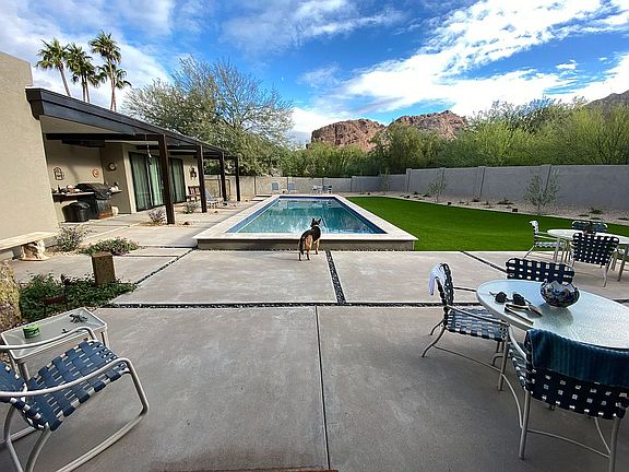 backyard with pool house