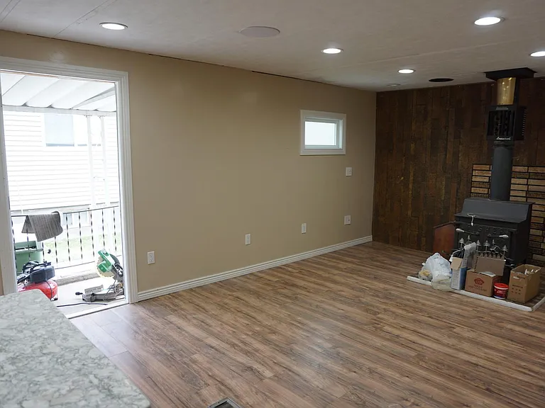 Second living are a with wood-burning fireplace.