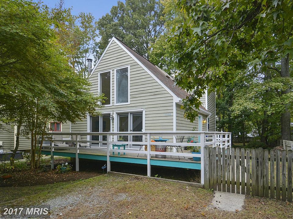 Front of home with wrap around deck!