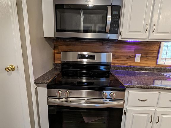 electric stove and built in microwave with exhaust fan to exterior