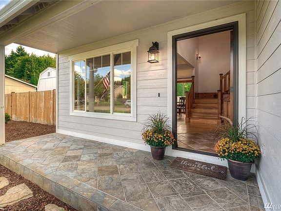 Welcome HOME! This is the charming covered front porch you have dreamed about. 