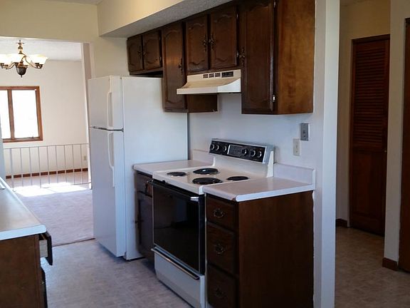 From kitchen eating area, through kitchen, pantry and storag