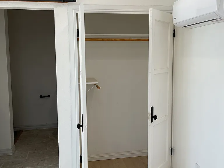 Closet, bathroom entry and mini-split