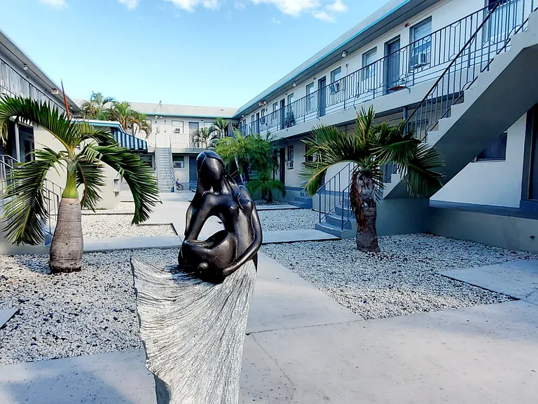 DOWNTOWN VILLAS LLC — Photo 13