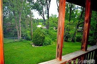 Large backyard - neighborhood park is in the background