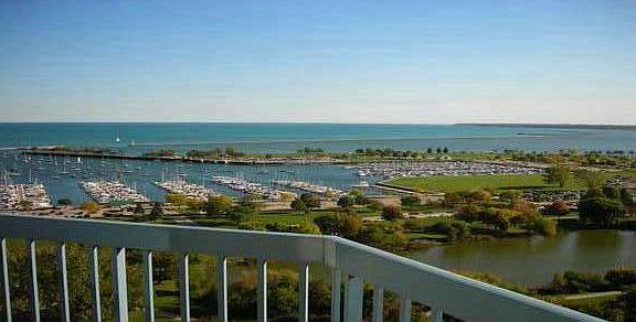 Balcony has lake and city view