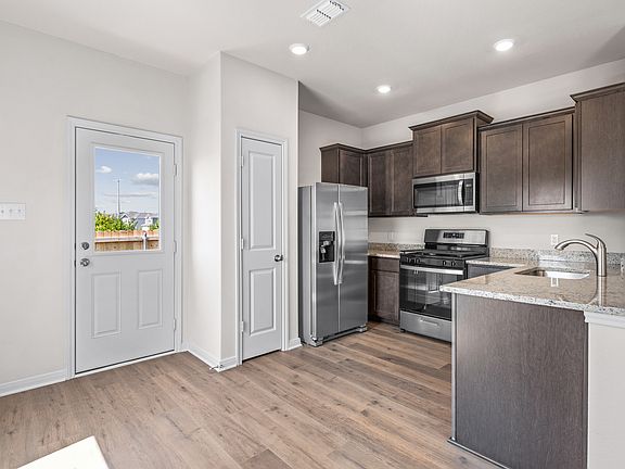 The kitchen has energy efficient appliances.