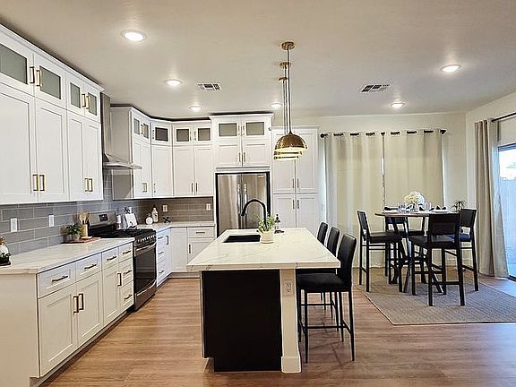 Sleek White Cabinets/Quartz 