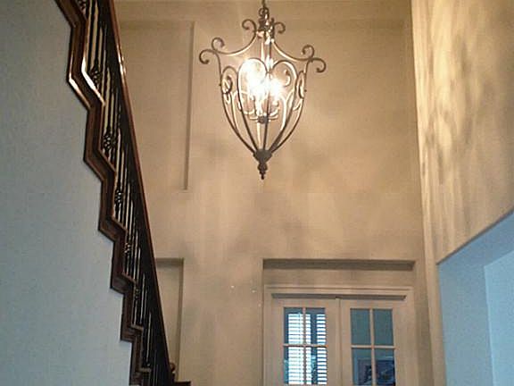 Study with plantation shutters at the front of the house
