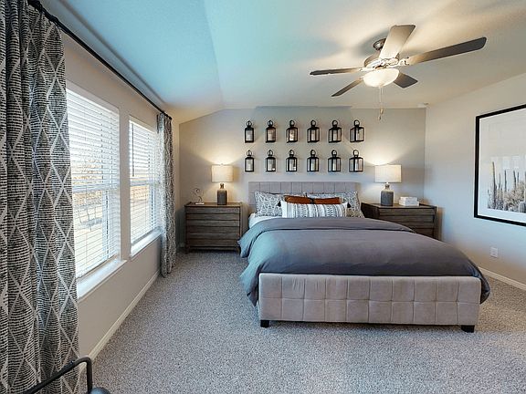Enjoy a primary suite tucked away in the back of the home.