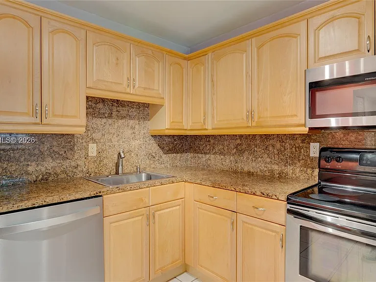 7910 Camino Real #N-105 — Photo 10