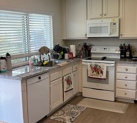 The remodel included all ne appliances. High end GE self cleaning oven and microwave, Bosch dishwasher. New window coverings throughout. Private, large laundry room adjacent kitchen