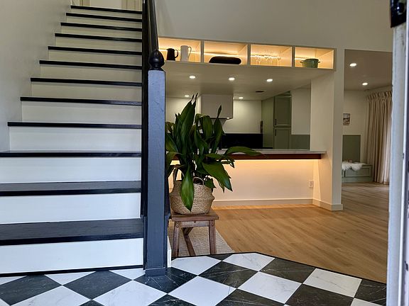 As you open the front door you will be welcomed into the open plan living area