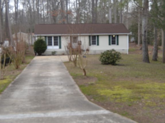 100 ft paved driveway