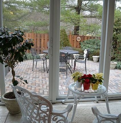 View from MBR through sun room to paver patio