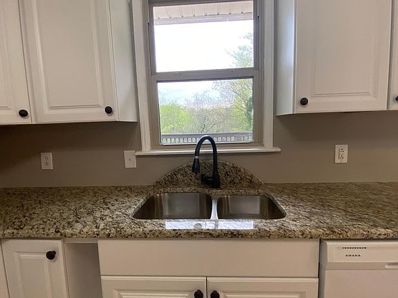 Custom Granite countertops and new Rub Oil Bronze Faucets