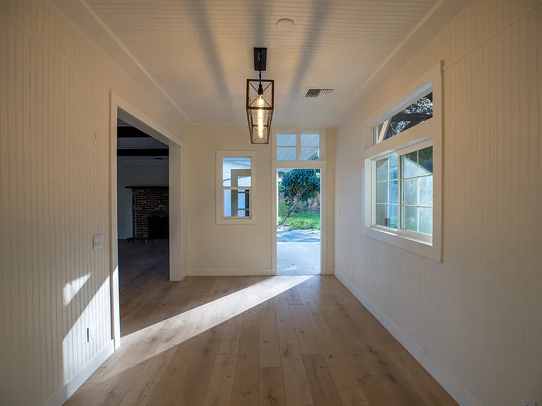 Very special dining room with high ceilings is an entertainer's dream.