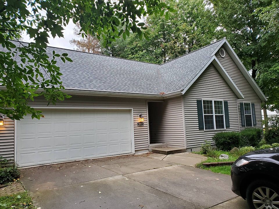 1st image of 5869 Woodbriar Dr NE