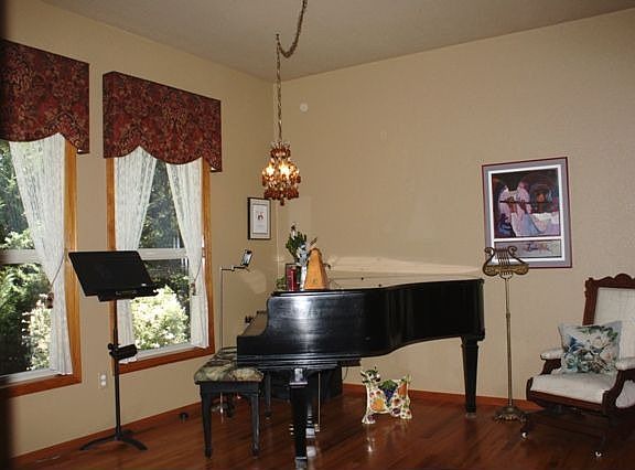 This is the formal dining room that is presently being used as a music room.