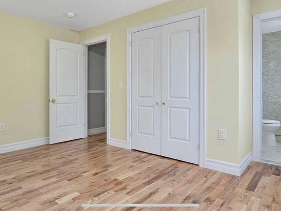 Master bedroom with bathroom