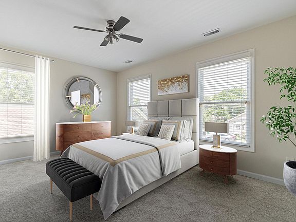 Bedroom 1. Spacious bedroom with room to relax and a walk-in closet for all your needs. Your private oasis for comfort and organization. Home has new carpet. Home has been virtually staged.