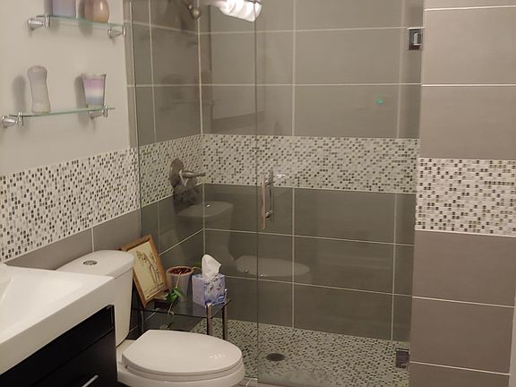 Newly renovated master en suite, double-sink, over-sized shower.