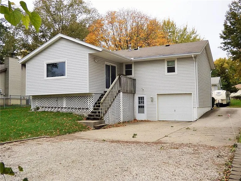 Back of house - w/ extra large parking area