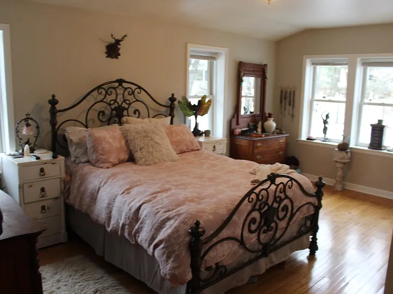 Large master bedroom. Bed is king sized