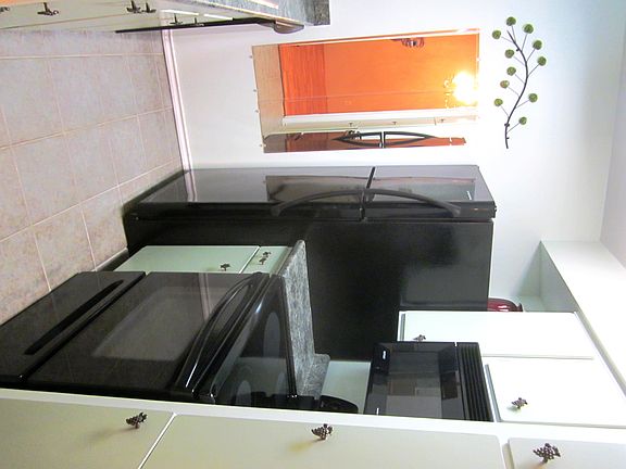 Sleek modern all black appliances.