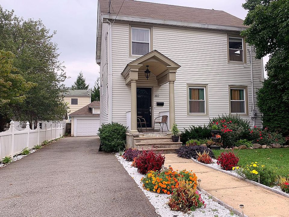 Front + spacious driveway 