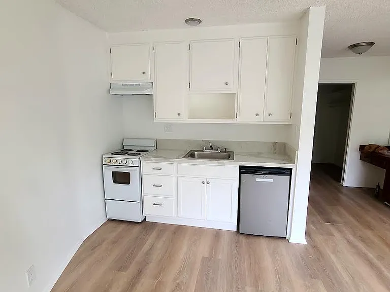 5555 W 8th St #102 — Photo 1
