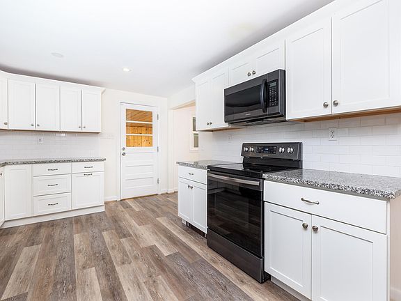 Kitchen, black stainless appliances, granite countertops