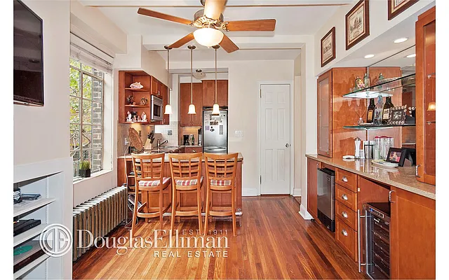 Sold by Douglas Elliman | media 13